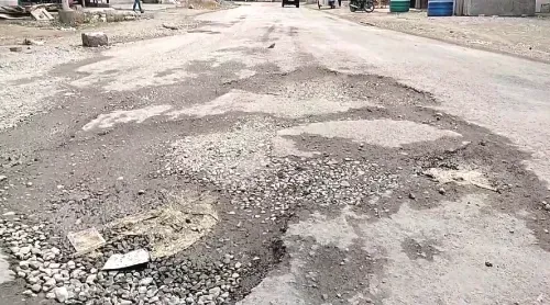 Commuters have a hard time because of the dilapidated Handwara-Sopore highway