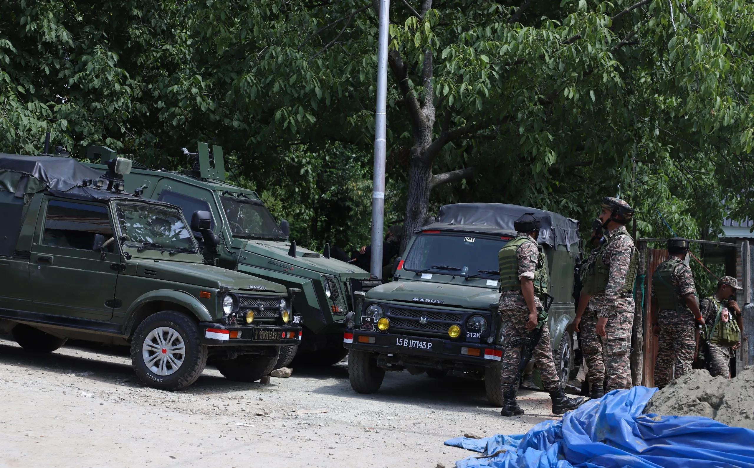 In pictures indian army at encounter site in harwan mulnar area srinagar