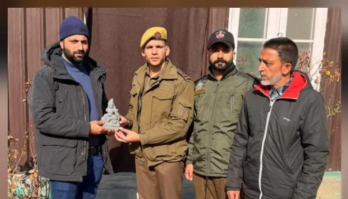 Police hand over sculpture recovered from Jhelum river in Baramulla